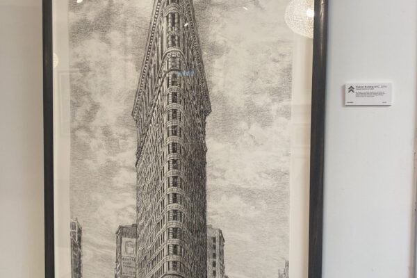 Roy Wright, a remarkable draughtsman, specializes in charcoal illustrations. His work intricately captures the essence of trees and cityscapes, revealing underlying rhythms beneath the surface.